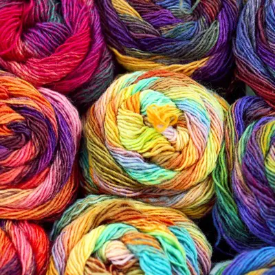 Skiens of rainbow wool at the Old Bus Depot Markets theme event - A Celebration of Wool