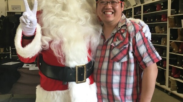 Old Bus Depot Markets Director, Anthony Niravong, with Santa. 2017