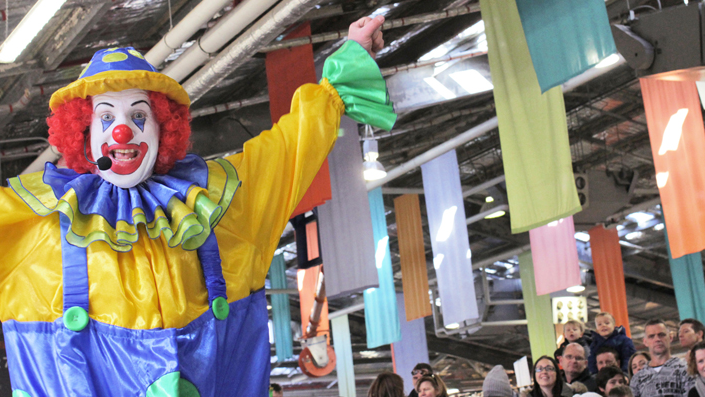 Milo the Clown performing at the Old Bus Depot Markets for their annual theme event, Kids in the Shed