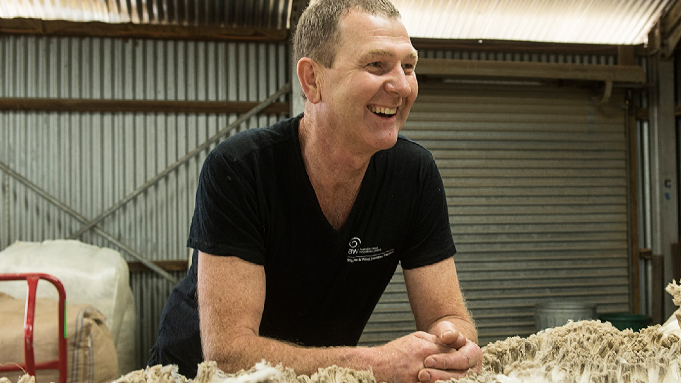 Ian Elkins from Elkins Alpaca Shearing with wool fleece